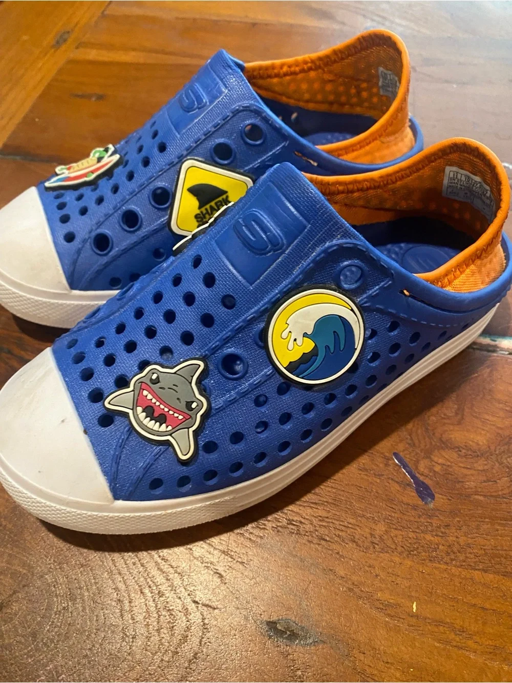 Skechers Kids Blue Slip-On Water Shoes with Orange Trim and Fun Charms